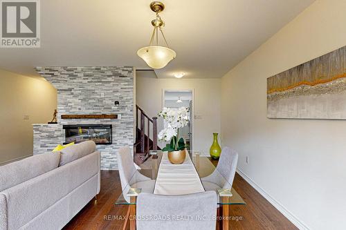 34 Bluegill Crescent, Whitby, ON - Indoor Photo Showing Dining Room With Fireplace