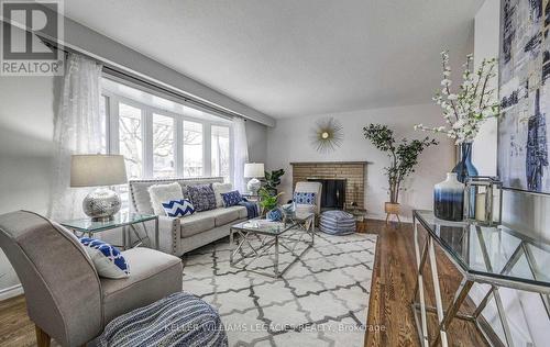 Main - 110 Clements Road E, Ajax, ON - Indoor Photo Showing Living Room With Fireplace