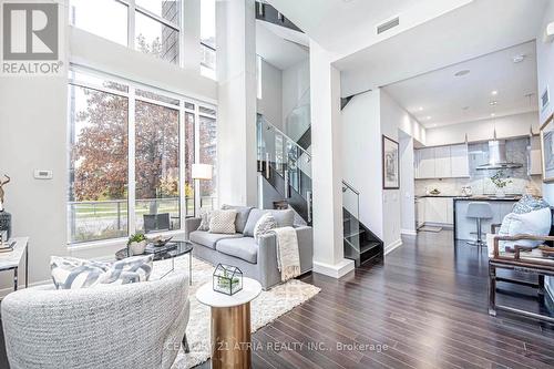 Th03 - 129 Mcmahon Drive, Toronto, ON - Indoor Photo Showing Living Room