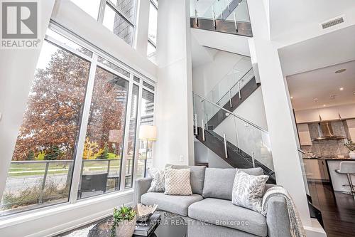 Th03 - 129 Mcmahon Drive, Toronto, ON - Indoor Photo Showing Living Room