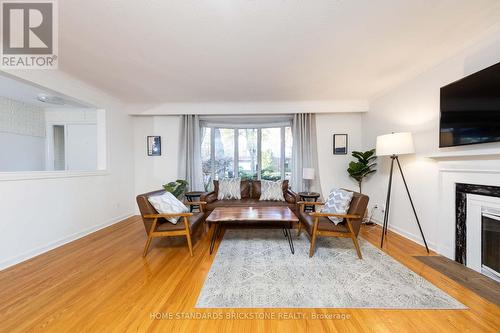 199 Dunforest Avenue, Toronto, ON - Indoor Photo Showing Living Room With Fireplace