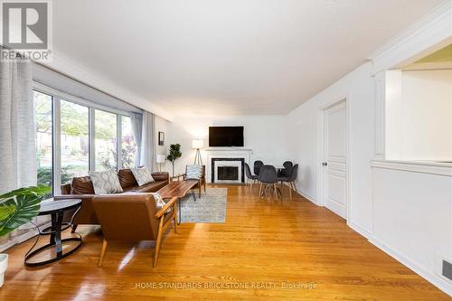 199 Dunforest Avenue, Toronto, ON - Indoor Photo Showing Living Room With Fireplace