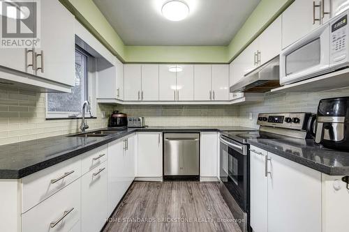 199 Dunforest Avenue, Toronto, ON - Indoor Photo Showing Kitchen With Double Sink