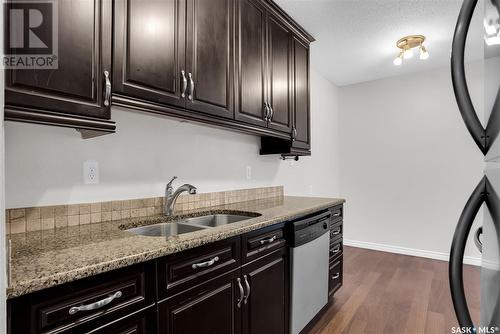 107 208 Saskatchewan Street, Saskatoon, SK - Indoor Photo Showing Kitchen With Double Sink