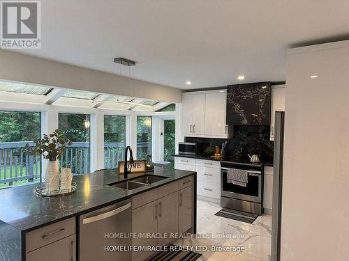 1491 Finch Avenue, Pickering, ON - Indoor Photo Showing Kitchen With Double Sink