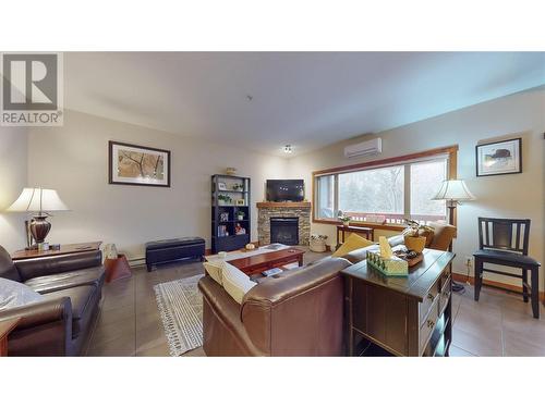 895 Dogwood Drive Unit# 26, Kimberley, BC - Indoor Photo Showing Living Room With Fireplace