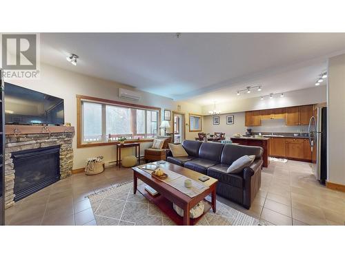 895 Dogwood Drive Unit# 26, Kimberley, BC - Indoor Photo Showing Living Room With Fireplace