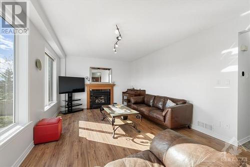 143 Baroness Drive, Ottawa, ON - Indoor Photo Showing Living Room With Fireplace