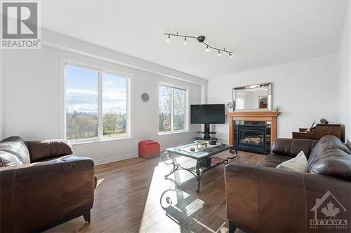 143 Baroness Drive, Ottawa, ON - Indoor Photo Showing Living Room With Fireplace