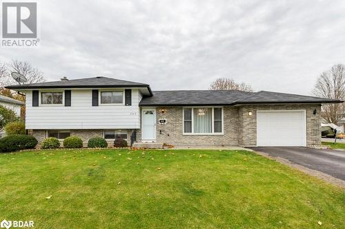 Split level home with a garage and a front yard - 262 Barrett Boulevard, Napanee, ON - Outdoor With Facade