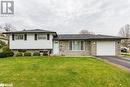 Split level home with a garage and a front yard - 262 Barrett Boulevard, Napanee, ON  - Outdoor With Facade 