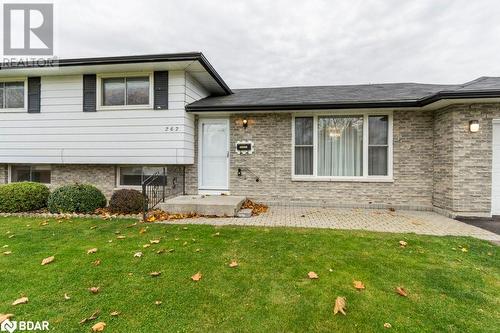 Tri-level home with a front lawn and a patio area - 262 Barrett Boulevard, Napanee, ON - Outdoor