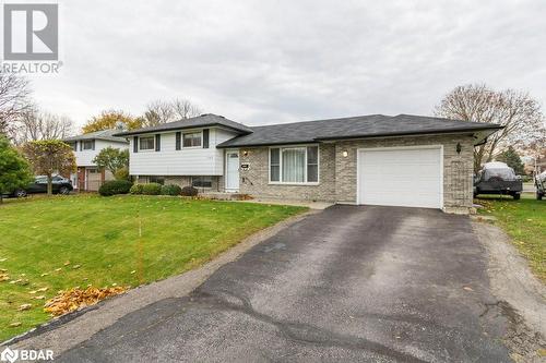 Split level home with a garage and a front yard - 262 Barrett Boulevard, Napanee, ON - Outdoor With Facade