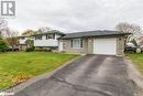 Split level home with a garage and a front yard - 262 Barrett Boulevard, Napanee, ON  - Outdoor With Facade 