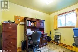 Office featuring light hardwood / wood-style floors - 