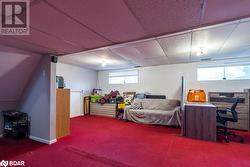 Carpeted bedroom featuring a paneled ceiling - 