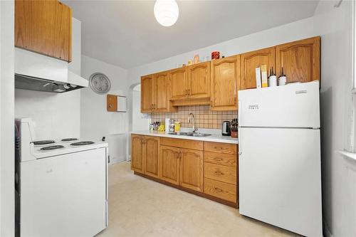 757 Inkster Boulevard, Winnipeg, MB - Indoor Photo Showing Kitchen With Double Sink