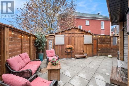 Back courtyard with insulated studio/shed - 123 Beckwith Street N, Smiths Falls, ON - Outdoor With Exterior