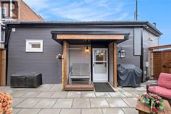 back door leading to courtyard. Space is wired for a hot tub - 