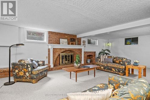 1021 Sydenham Road, Kingston (City Northwest), ON - Indoor Photo Showing Living Room With Fireplace