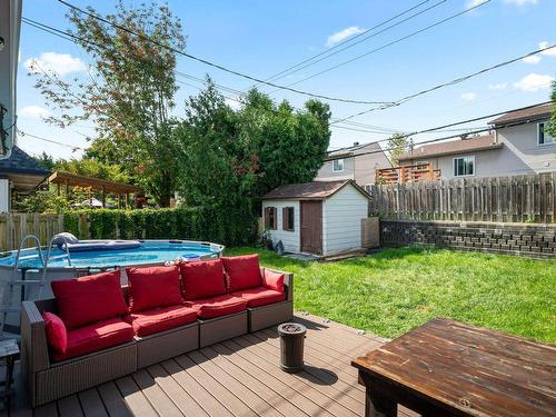 Cour - 6346 Rue De Prince-Rupert, Laval (Auteuil), QC - Outdoor With Above Ground Pool With Deck Patio Veranda With Backyard