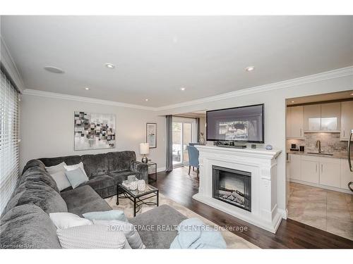 2-669 Francis Rd, Burlington, ON - Indoor Photo Showing Living Room With Fireplace