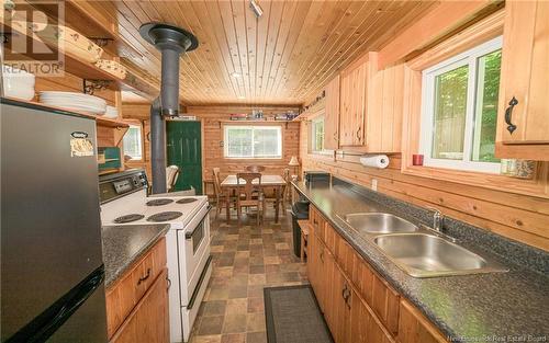 40 Skiers Lane, Crabbe Mountain, NB - Indoor Photo Showing Kitchen With Double Sink