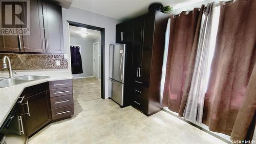 145 3Rd Avenue Ne, Swift Current, SK - Indoor Photo Showing Kitchen With Double Sink