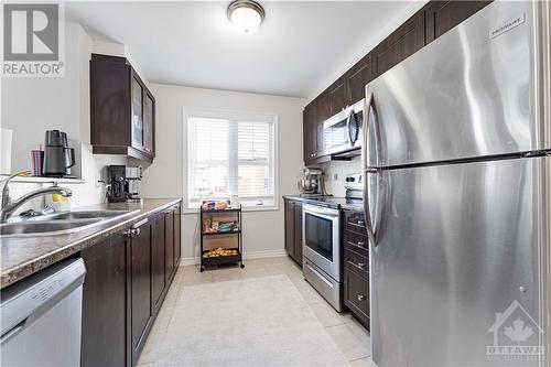 74 Feathertop Lane, Stittsville, ON - Indoor Photo Showing Kitchen With Stainless Steel Kitchen With Double Sink