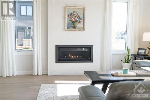 608 Bridgeport Avenue, Ottawa, ON - Indoor Photo Showing Living Room With Fireplace