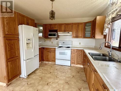 22 Poundmaker Trail, North Battleford, SK - Indoor Photo Showing Kitchen With Double Sink