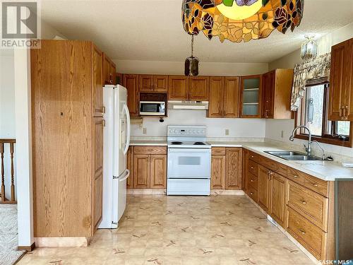 22 Poundmaker Trail, North Battleford, SK - Indoor Photo Showing Kitchen With Double Sink