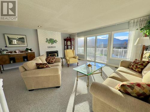 112 Wiltse Place, Penticton, BC - Indoor Photo Showing Living Room With Fireplace