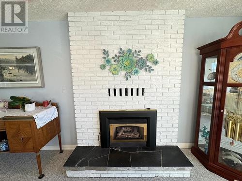 112 Wiltse Place, Penticton, BC - Indoor Photo Showing Living Room With Fireplace