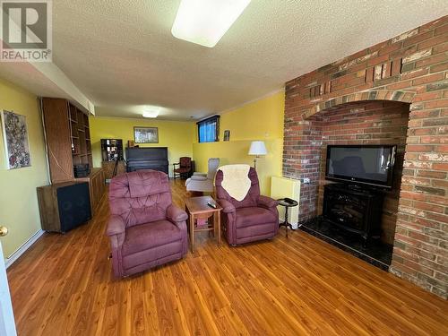 112 Wiltse Place, Penticton, BC - Indoor Photo Showing Living Room With Fireplace