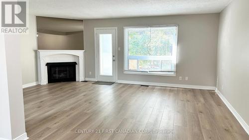 8 - 683 Windermere Road, London, ON - Indoor Photo Showing Other Room With Fireplace