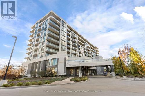 608 - 7711 Green Vista Gate, Niagara Falls, ON - Outdoor With Balcony With Facade