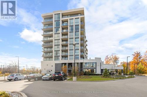 608 - 7711 Green Vista Gate, Niagara Falls, ON - Outdoor With Balcony With Facade