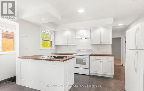 11 Garnet Street, St. Catharines, ON - Indoor Photo Showing Kitchen With Double Sink