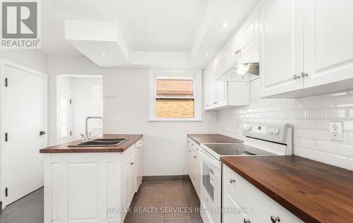 11 Garnet Street, St. Catharines, ON - Indoor Photo Showing Kitchen With Double Sink