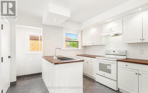 11 Garnet Street, St. Catharines, ON - Indoor Photo Showing Kitchen With Double Sink