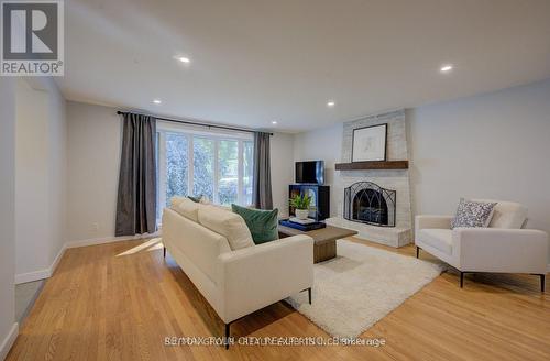 Upper - 18 Jay Court, Kitchener, ON - Indoor Photo Showing Living Room With Fireplace