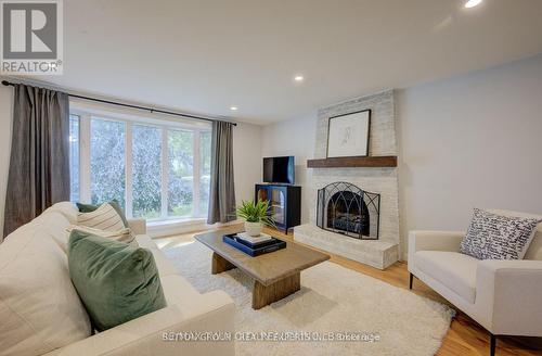 Upper - 18 Jay Court, Kitchener, ON - Indoor Photo Showing Living Room With Fireplace