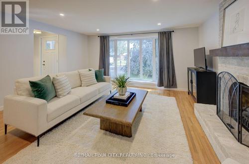 Upper - 18 Jay Court, Kitchener, ON - Indoor Photo Showing Living Room With Fireplace