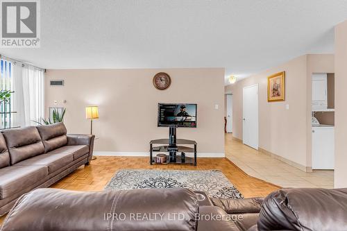 213 - 12 Laurelcrest Street, Brampton, ON - Indoor Photo Showing Living Room