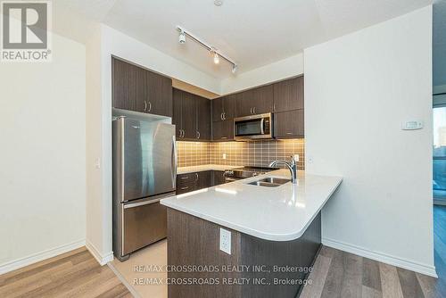 216 - 39 Annie Craig Drive, Toronto, ON - Indoor Photo Showing Kitchen With Stainless Steel Kitchen With Double Sink With Upgraded Kitchen