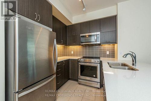 216 - 39 Annie Craig Drive, Toronto, ON - Indoor Photo Showing Kitchen With Stainless Steel Kitchen With Double Sink With Upgraded Kitchen