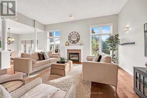 91 Southcreek Court, Hamilton, ON - Indoor Photo Showing Living Room With Fireplace