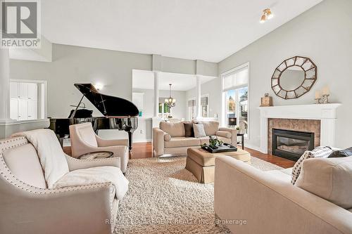 91 Southcreek Court, Hamilton, ON - Indoor Photo Showing Living Room With Fireplace