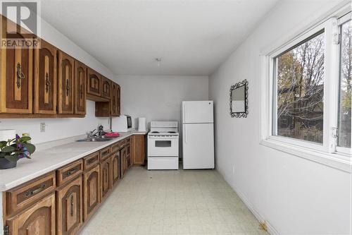 144 Woodward Ave, Sault Ste. Marie, ON - Indoor Photo Showing Kitchen With Double Sink